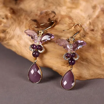 Amethyst earrings side view with handcrafted details