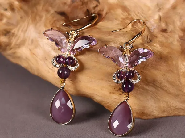 Amethyst earrings side view with handcrafted details