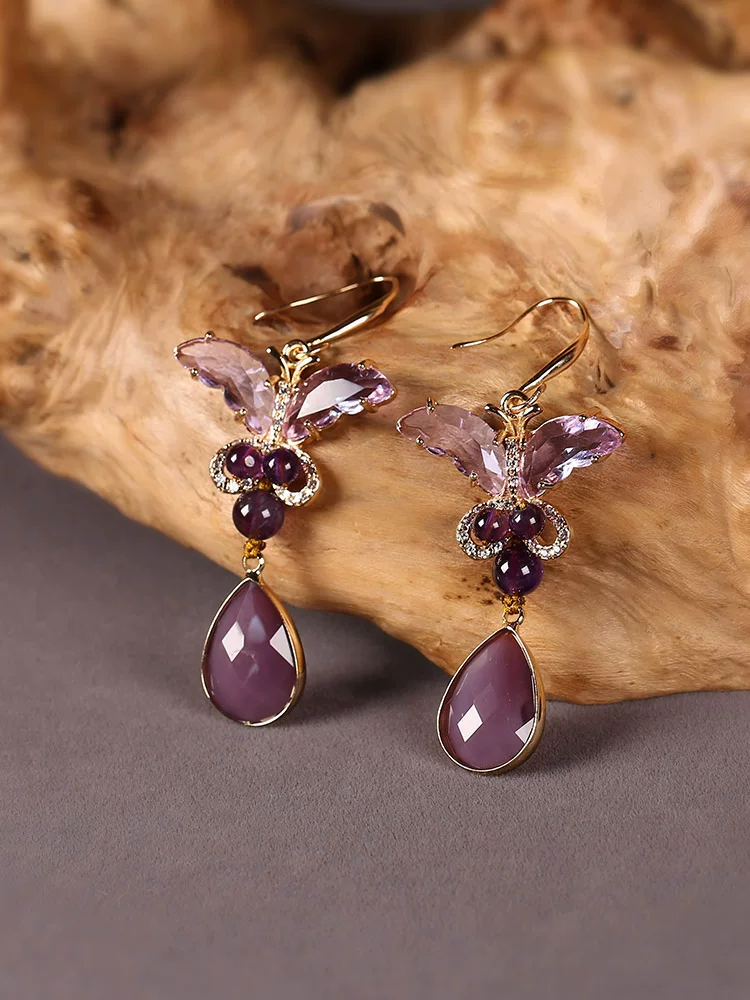 Amethyst earrings side view with handcrafted details