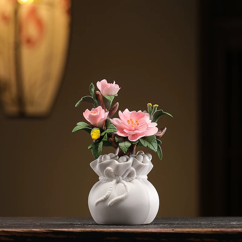 Hand-pinched ceramic flower ornaments