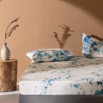 Handmade indigo plant cloud dyeing cotton and linen four-piece set artisan hand-rolled edges technique detail