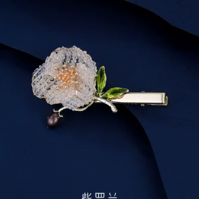 Tenant language flower hairpin — artisan hair accessories by Ginkgoods