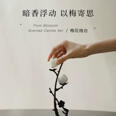 Imperial Plum Blossom Metal Candlestick lifestyle display on natural backdrop
