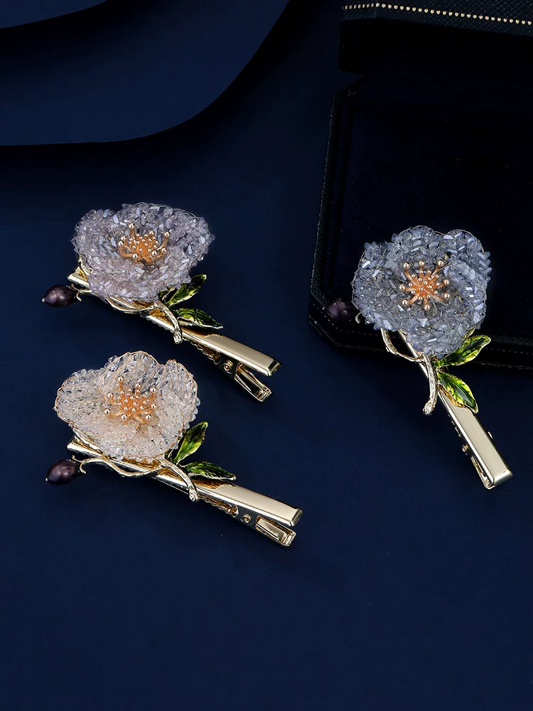Tenant language flower hairpin side view with handcrafted details