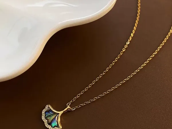 Artisan Abalone Shell Ginkgo Leaf Pendant Necklace side view with handcrafted details