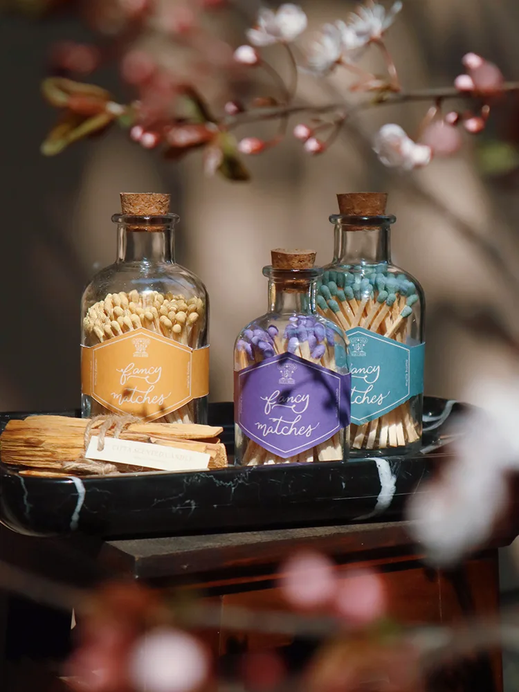 Scented candles are specially lit with matches