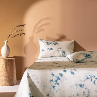 Handmade indigo plant cloud dyeing cotton and linen four-piece set detail view showing 100% grade 6a mulberry silk texture...