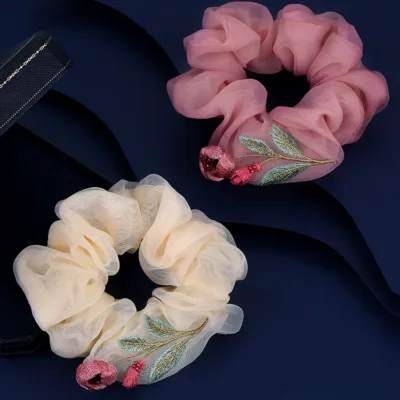 Artisan Camellia Silk Scrunchie detail view showing 100% mulberry silk texture and finish