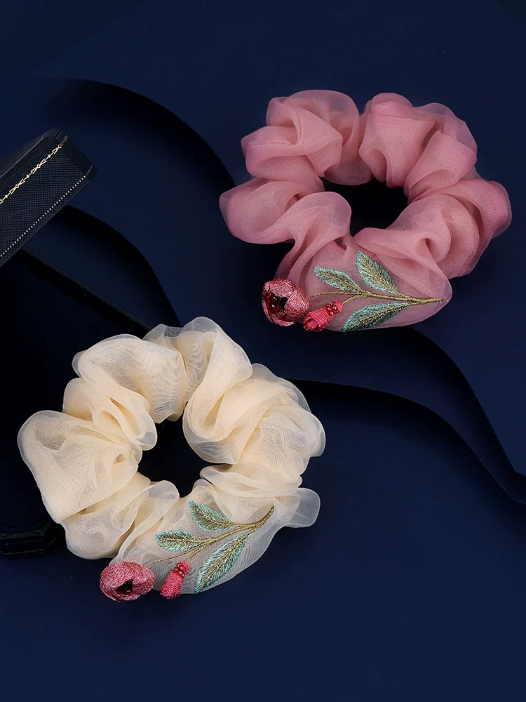 Artisan Camellia Silk Scrunchie detail view showing 100% mulberry silk texture and finish