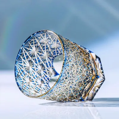 Imperial Blue Daisy Crystal Tea Glass lifestyle display on natural backdrop