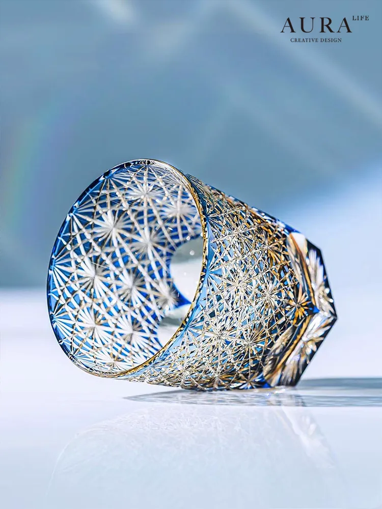 Imperial Blue Daisy Crystal Tea Glass lifestyle display on natural backdrop