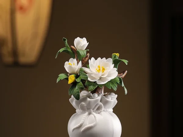 Hand-pinched ceramic flower ornaments