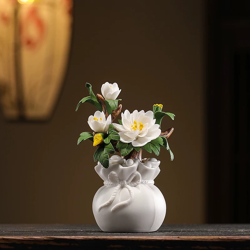 Hand-pinched ceramic flower ornaments