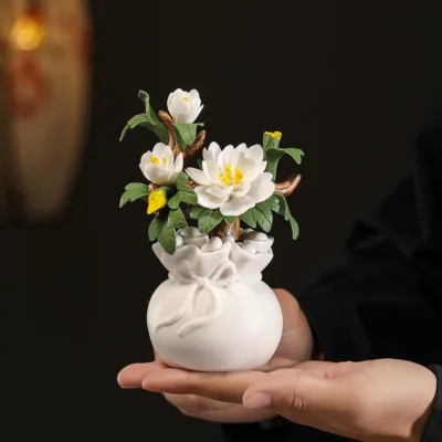 Hand-pinched ceramic flower ornaments
