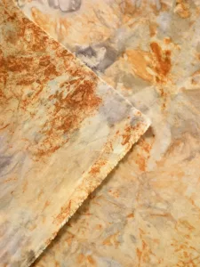 Black tea rust dyeing, plant dyeing, tie-dye fabric, pure cotton lifestyle display on natural backdrop
