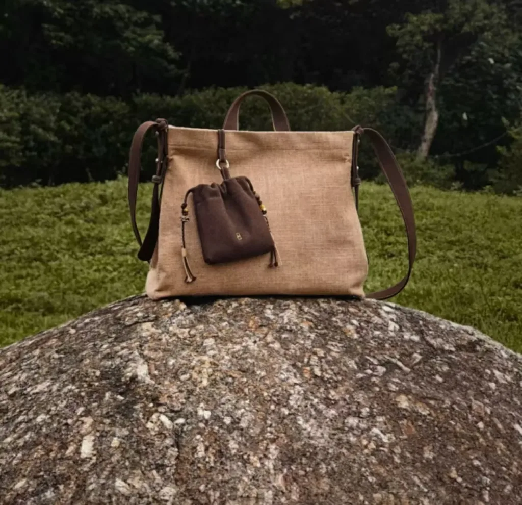 The tea dye crossbody bag is brown — artisan product image by Ginkgoods