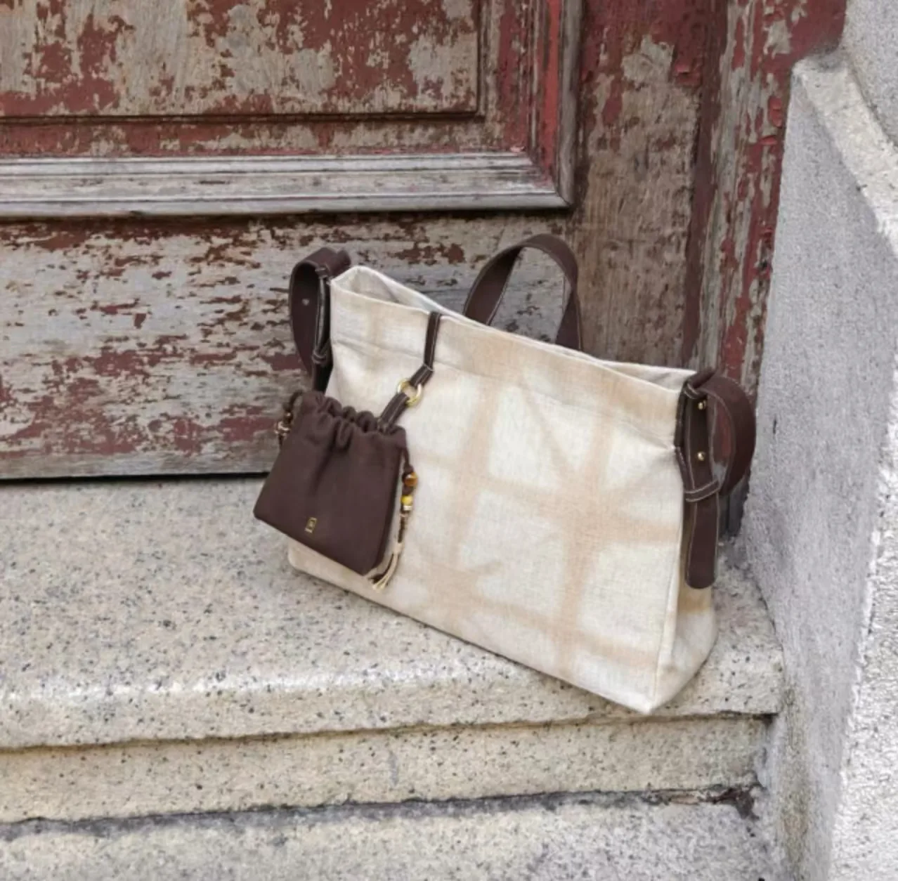 Amber tea dyed crossbody bag detail showing natural brown textile variation