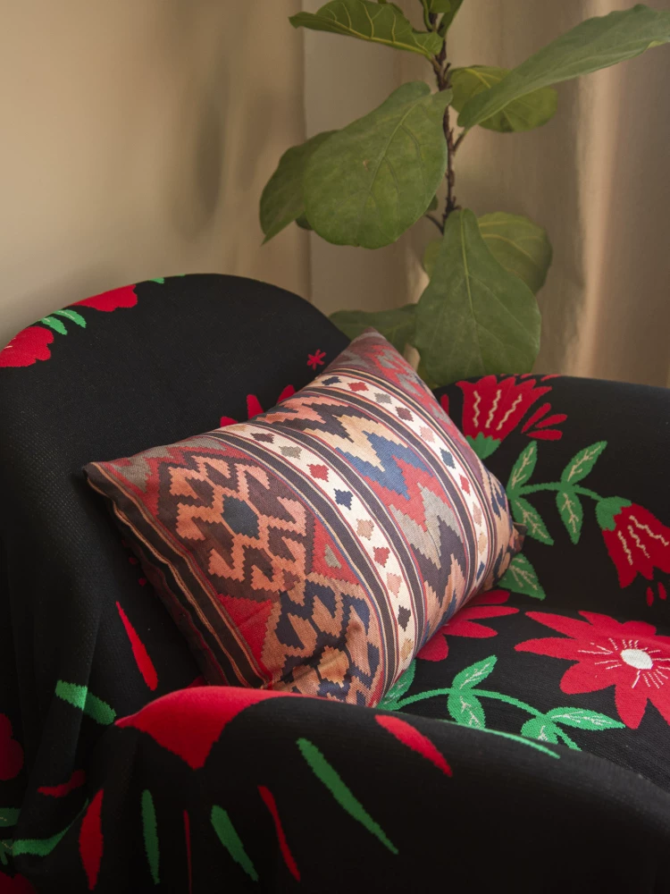 Bohemian Heavy Linen Lumbar Pillow showing tea-dyed textile and handmade bag detail