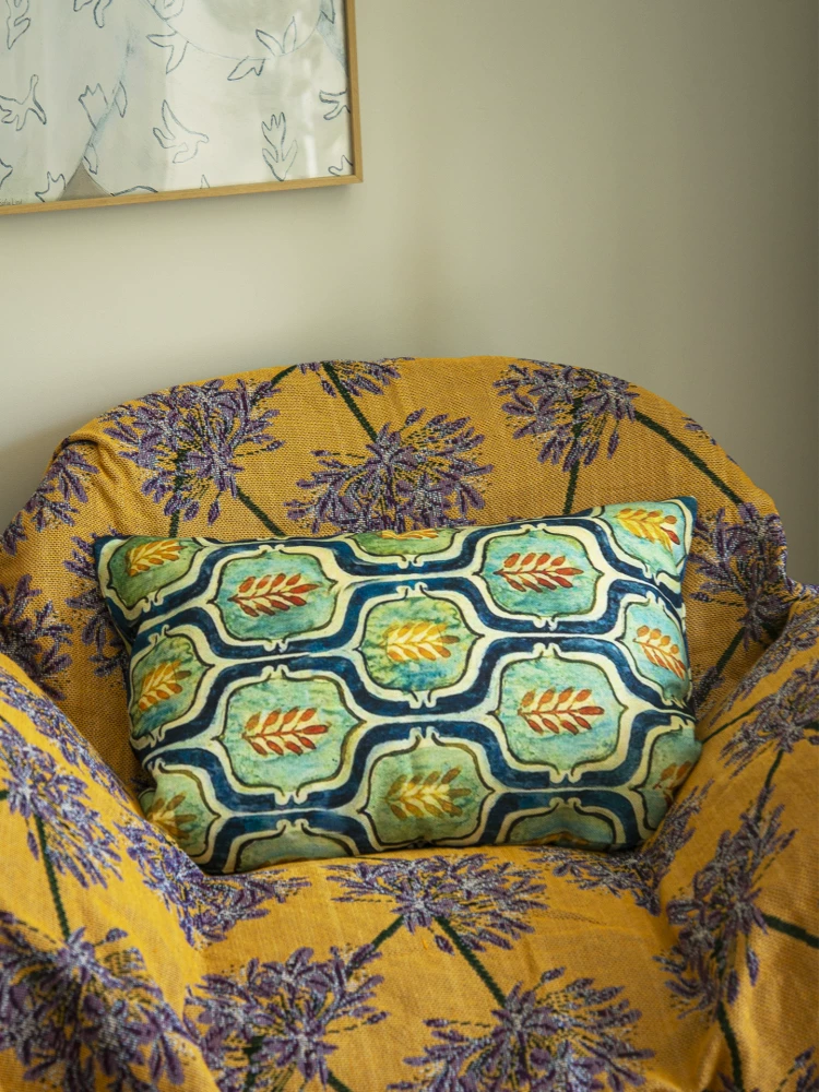 Bohemian Heavy Linen Lumbar Pillow showing tea-dyed textile and handmade bag detail