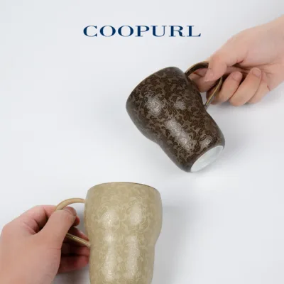 Carved Ceramic Coffee Mug showing carved relief ceramic surface texture