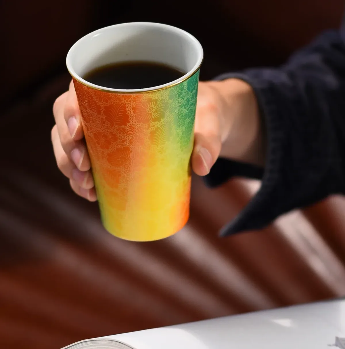 Carved Ceramic Tumbler Mug showing carved relief ceramic surface texture
