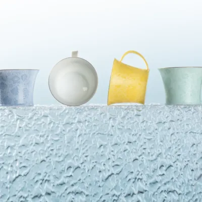 Carved Rice Grain Porcelain Coffee Mug showing rice-grain translucent porcelain ceramic craft