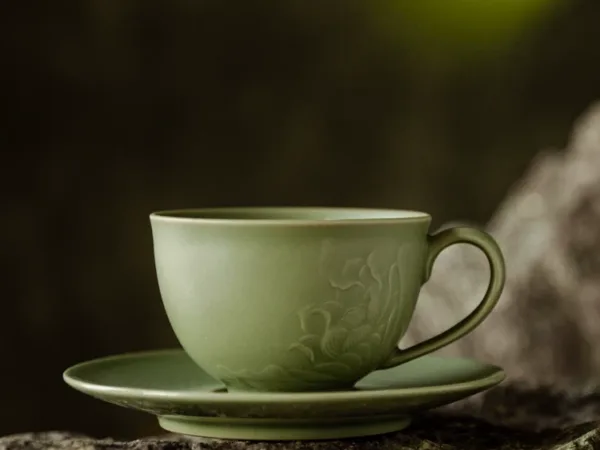 Celadon Lotus Ceramic Coffee Mug showing ceramic craft and surface detail