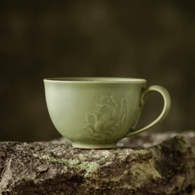 Celadon Lotus Ceramic Coffee Mug showing ceramic craft and surface detail