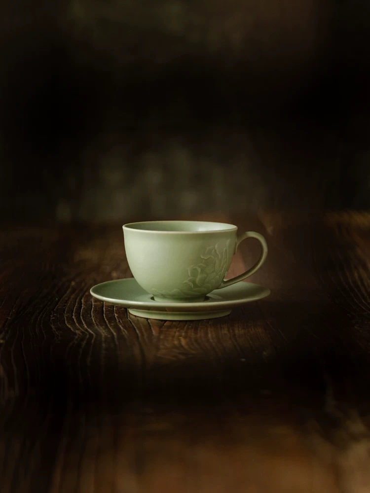 Celadon Lotus Ceramic Coffee Mug showing ceramic craft and surface detail