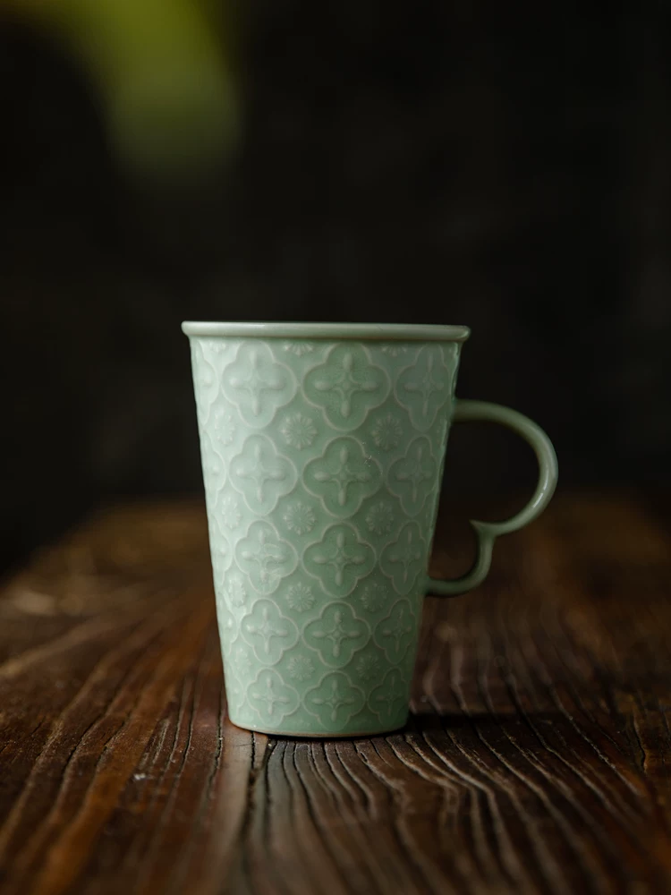 Celadon Relief Ceramic Coffee Mug showing ceramic craft and surface detail
