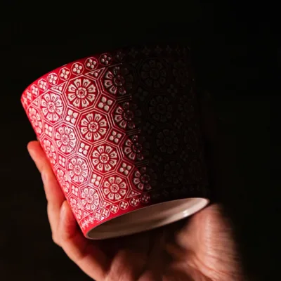 Floral Relief Ceramic Coffee Mug showing carved relief ceramic surface texture