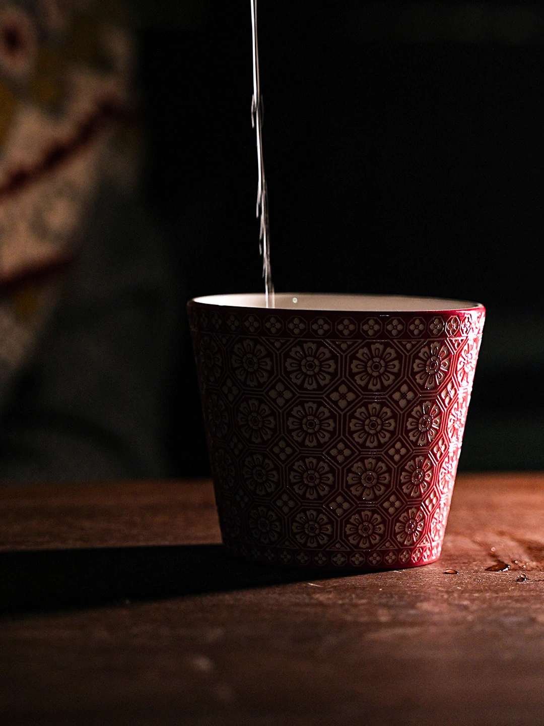 Floral Relief Ceramic Coffee Mug showing carved relief ceramic surface texture