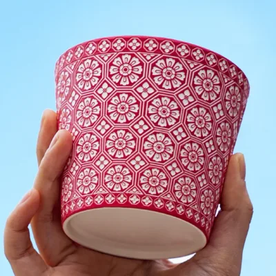 Floral Relief Ceramic Coffee Mug showing carved relief ceramic surface texture