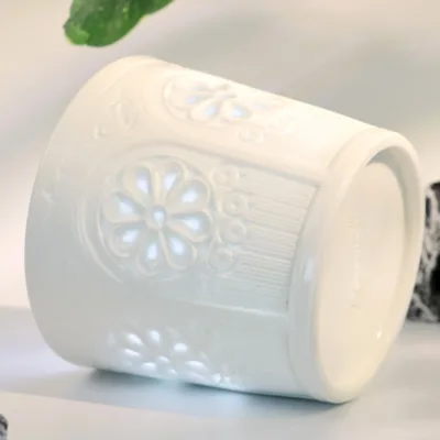 Floral Shadow Relief Ceramic Coffee Mug showing carved relief ceramic surface texture