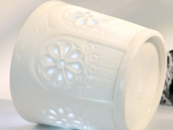 Floral Shadow Relief Ceramic Coffee Mug showing carved relief ceramic surface texture
