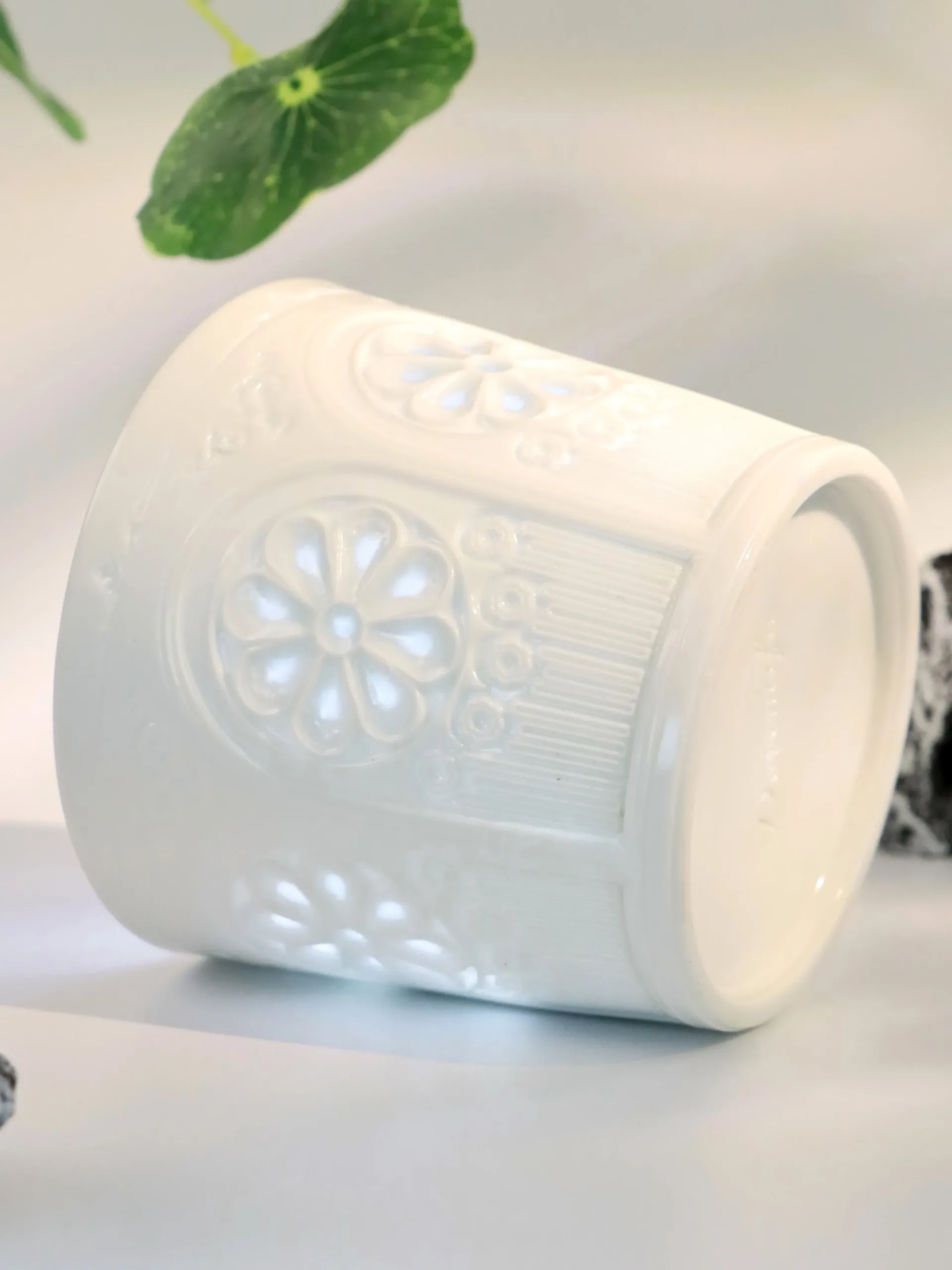 Floral Shadow Relief Ceramic Coffee Mug lifestyle image