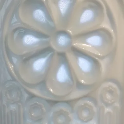 Floral Shadow Relief Ceramic Coffee Mug showing carved relief ceramic surface texture