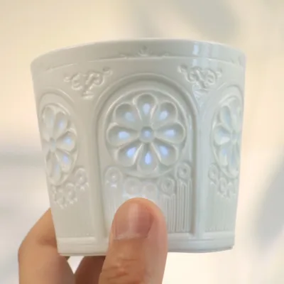 Floral Shadow Relief Ceramic Coffee Mug showing carved relief ceramic surface texture
