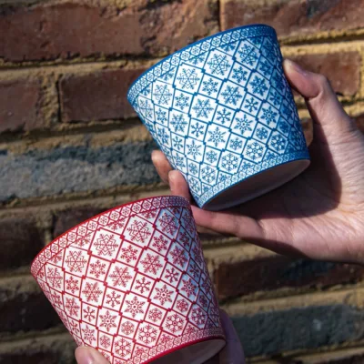 Snowflake Relief Ceramic Coffee Mug showing carved relief ceramic surface texture