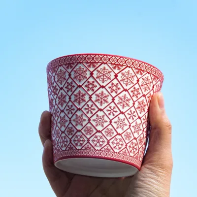 Snowflake Relief Ceramic Coffee Mug showing carved relief ceramic surface texture