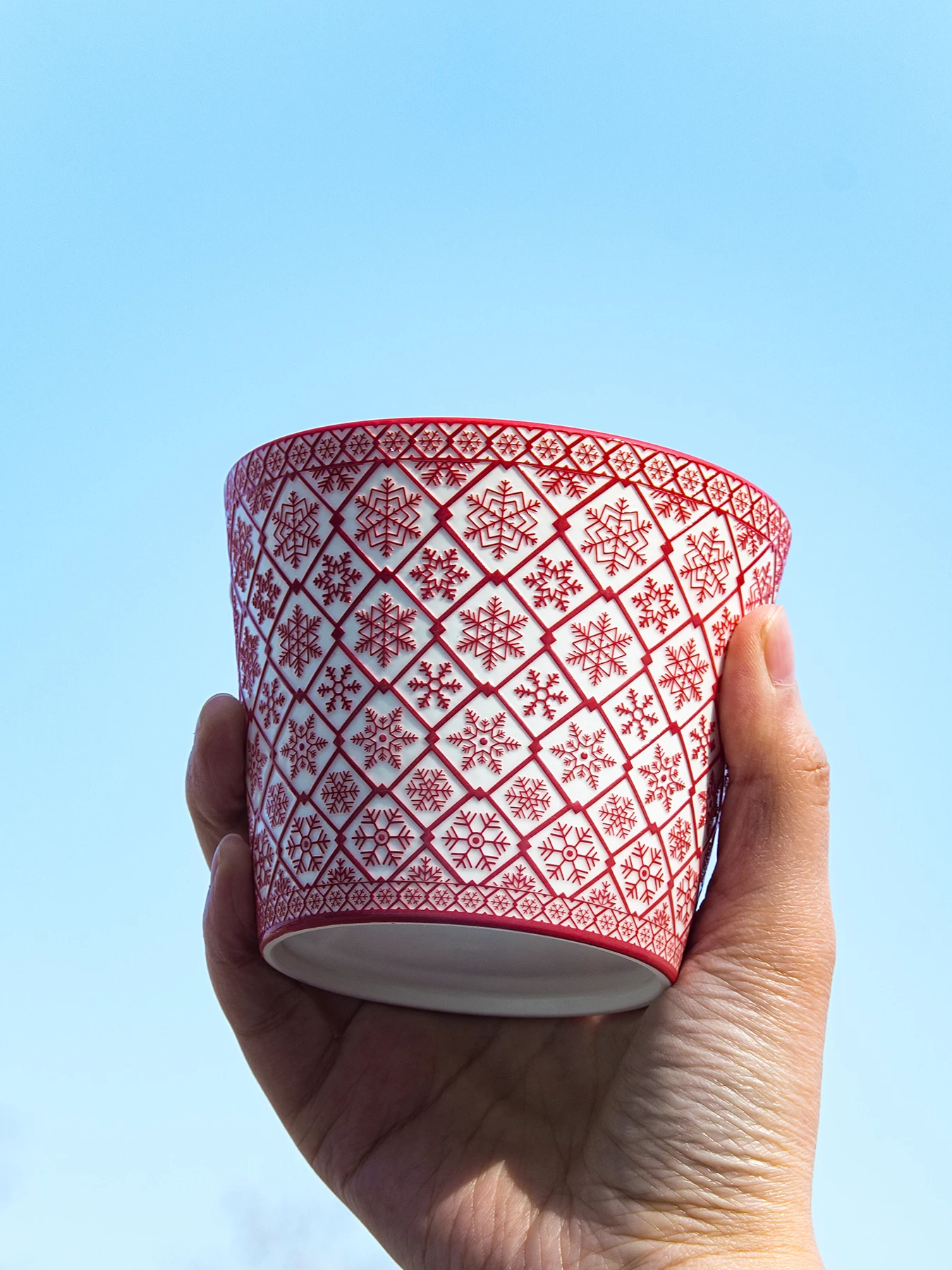 Snowflake Relief Ceramic Coffee Mug lifestyle image
