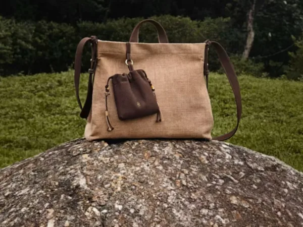 The tea dye crossbody bag is brown — artisan product image by Ginkgoods