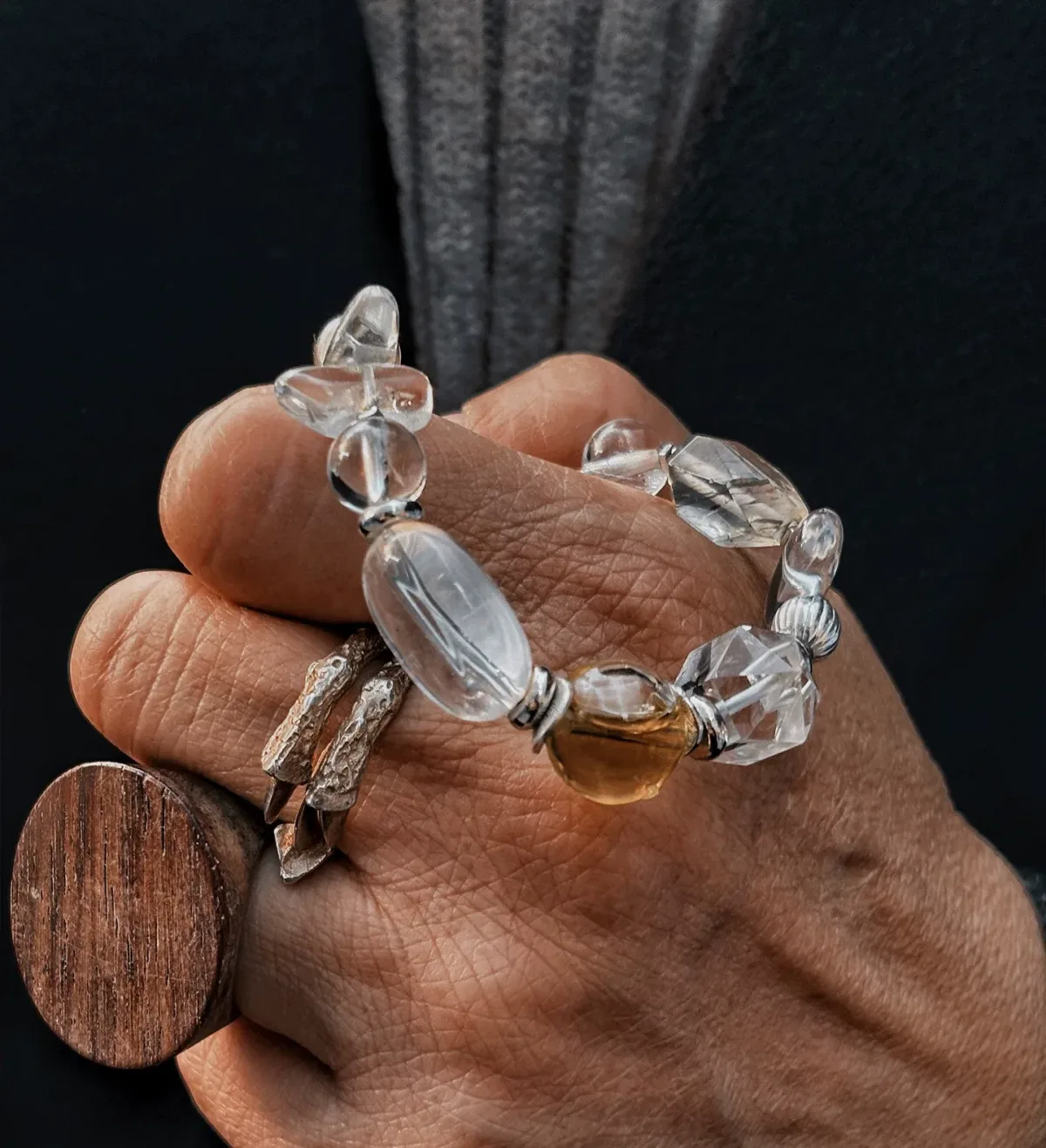White crystal essential oil bracelet showing clear crystal beads and guardian energy styling