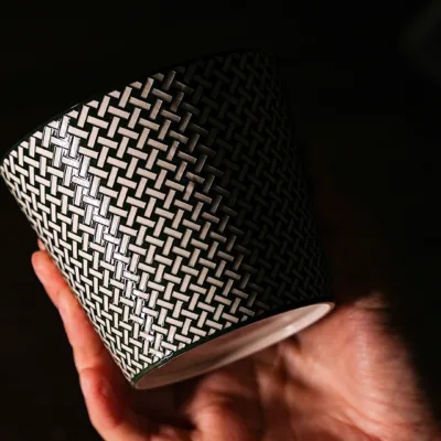 Woven Pattern Relief Ceramic Coffee Mug showing carved relief ceramic surface texture