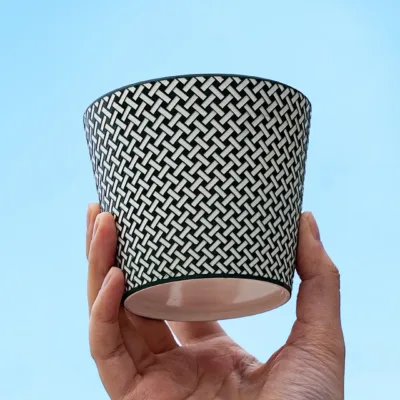 Woven Pattern Relief Ceramic Coffee Mug showing carved relief ceramic surface texture